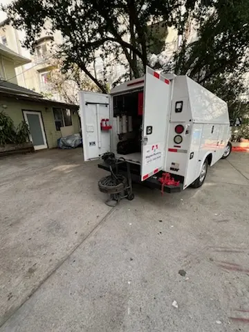 Magnet Plumbing service vehicle on-site for Grease Trap Cleaning in Hidden Hills